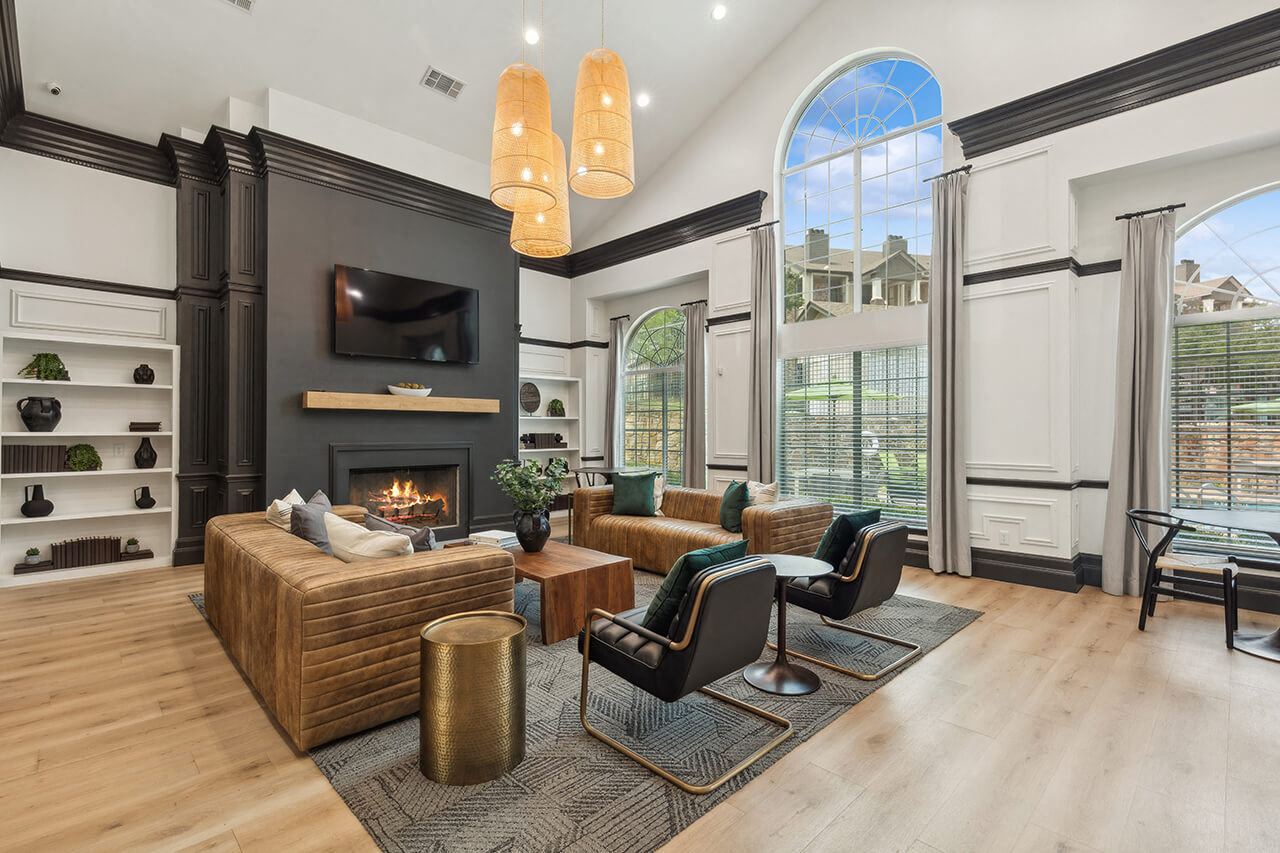 An empty dining room with hardwood floors at the Cypress View Villas Apartments in Weatherford, Texas.